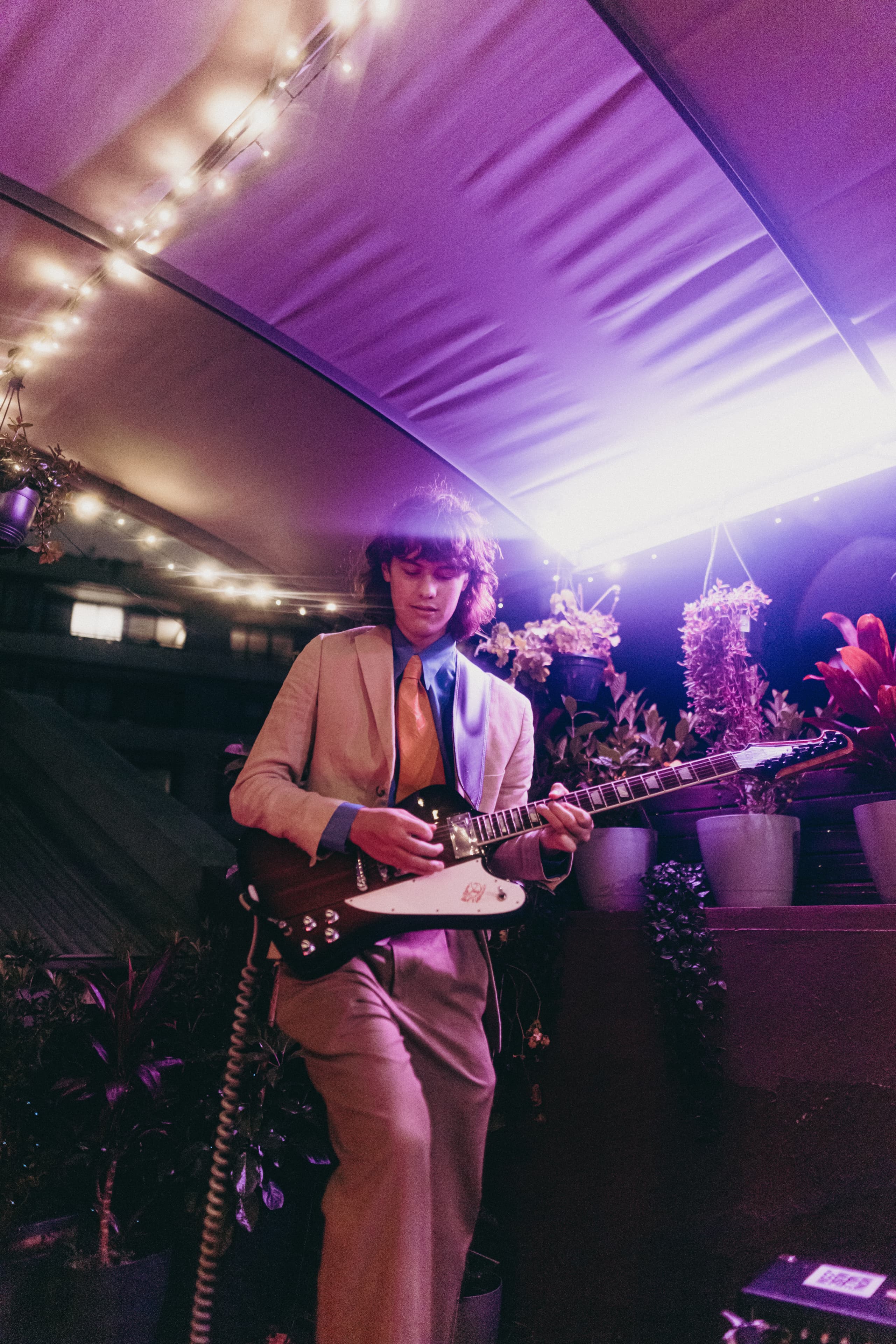 Artist performing live at Mood on the Roof — live music series video and photography production by Mude Sydney