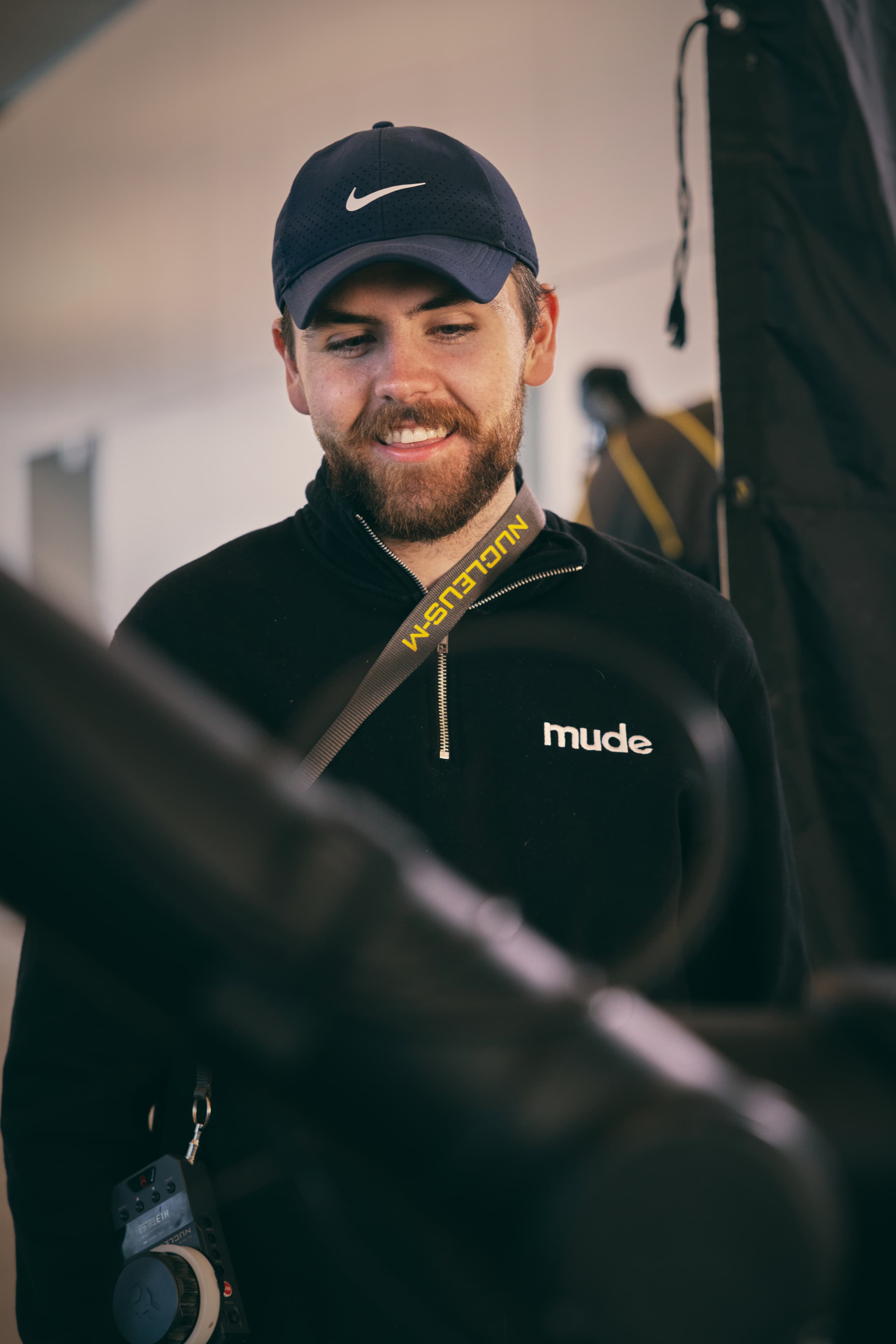 Mude crew member operating cinema camera rig on set — behind-the-scenes music video production by Mude creative agency Sydney