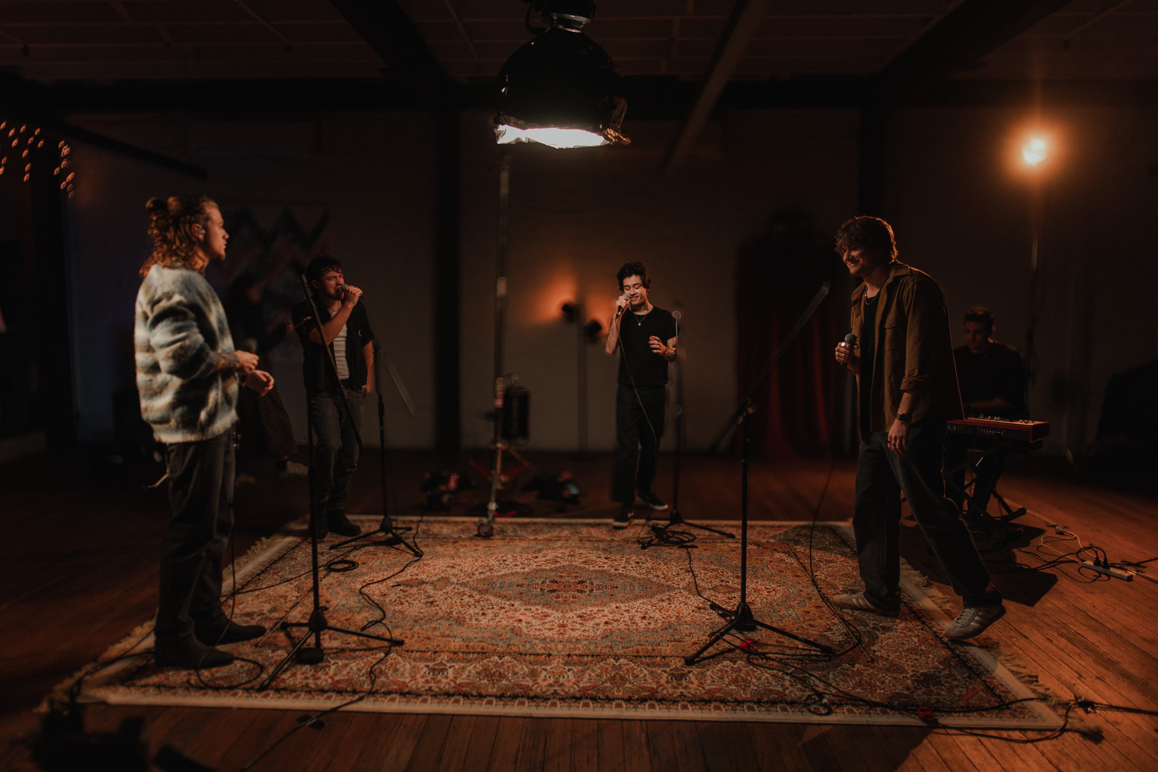 Midnight Til Morning performing live — video production still from studio session capturing raw performance energy.